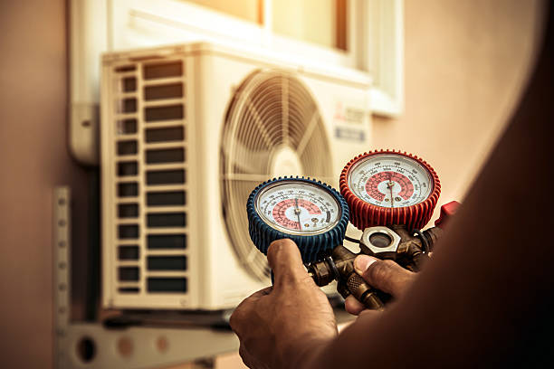 Professional Air Conditioning Service technician working in Woodsboro, MD